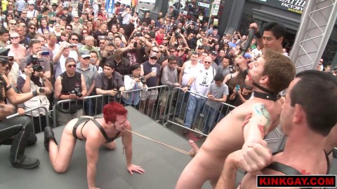 Dude gets his balls crushed in public during a crazy BDSM show!