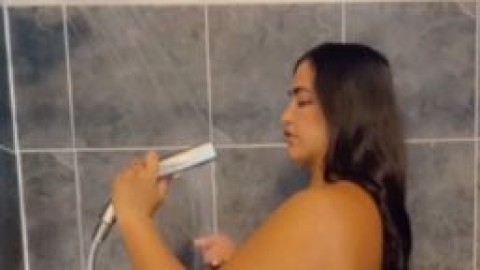 realdiamonddoll taking a shower using shower head