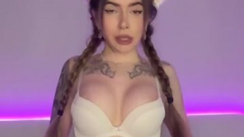 The plumbs of this sweetheart are painted with whore-ish crimson and she is wearing a nude cat costume while providing a fantast