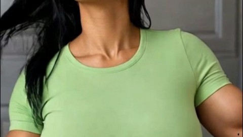 Hot Muscular Transgirl in Green Top Shows Off Her Bulge