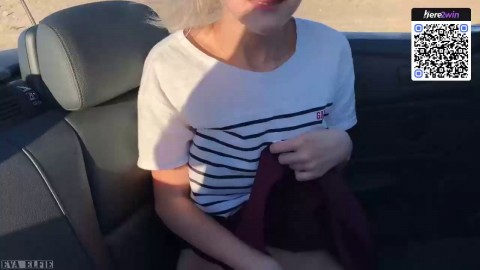 Blonde youthful adult displays her backside in a car