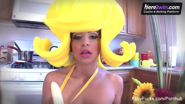 Female adult with immense funbags milks in kitchen