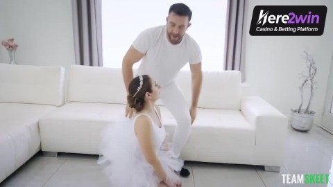 Busty young ballet dancer in a tutu gets impaled by her paramour on a white sofa