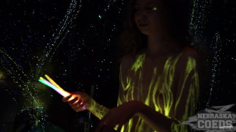 Naked Model Uses Glowsticks for Neon Body Paint Art